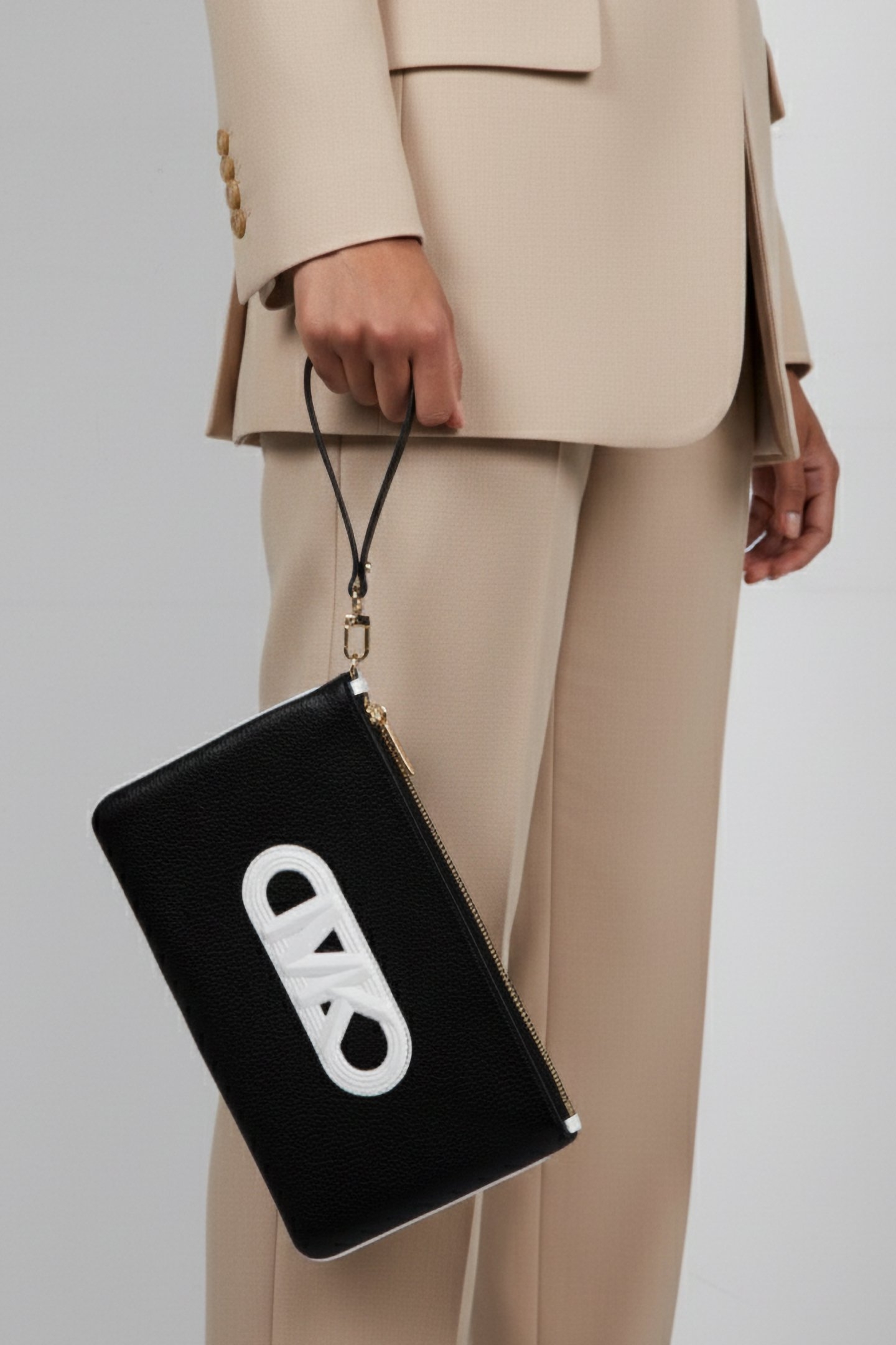 LEATHER TOP ZIP WRISTLET IN BLACK AND WHITE 1