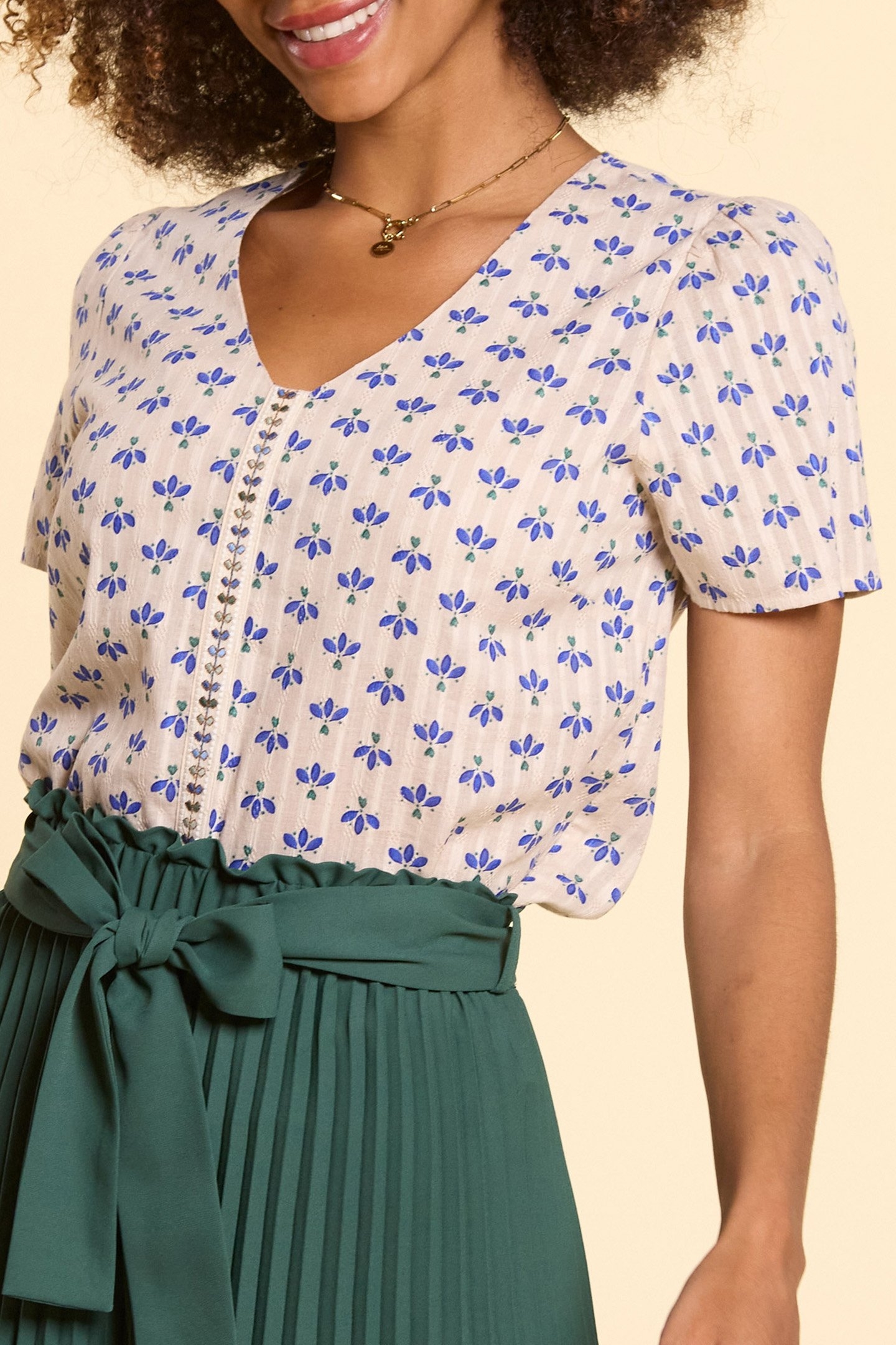 OFF-WHITE TOP WITH BLUE PETAL PRINT 1