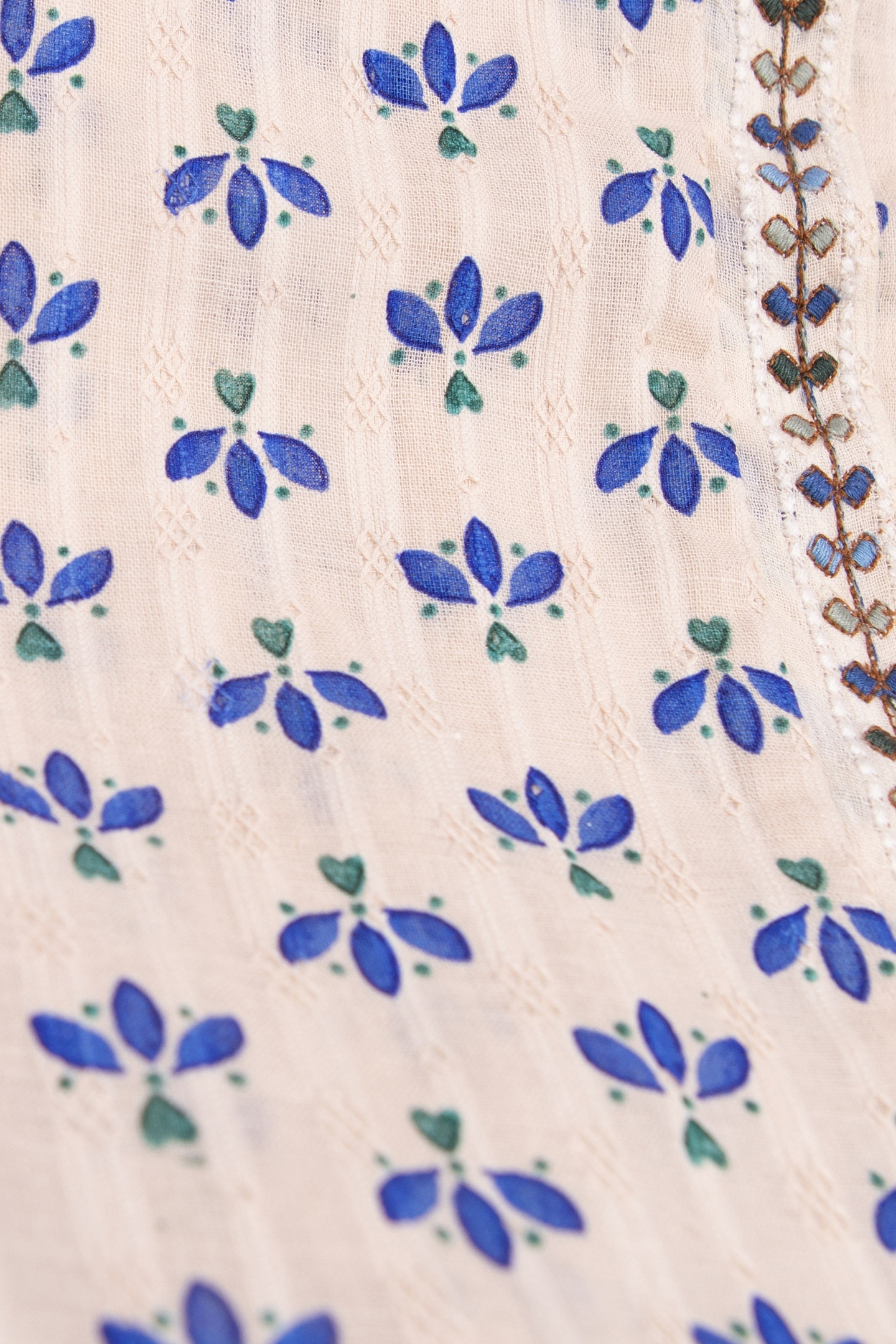 OFF-WHITE TOP WITH BLUE PETAL PRINT 7